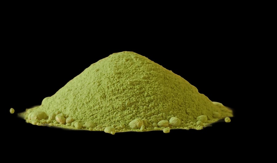 A mound of finely milled green matcha powder